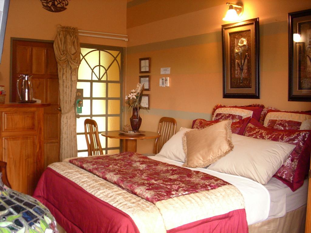 Native Abode Panzió Bon Accord Village Szoba fotó
